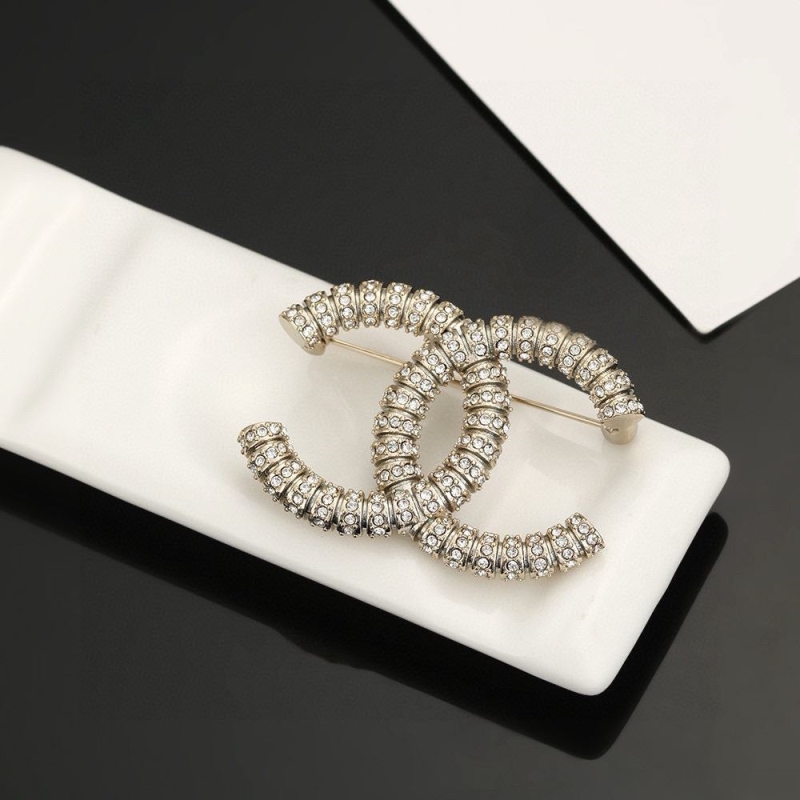 Ch**el brooches